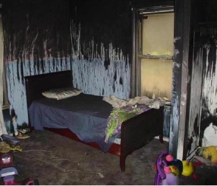 Fire damage in a bedroom 