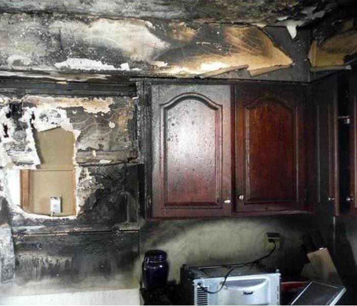 Fire damage all over kitchen 