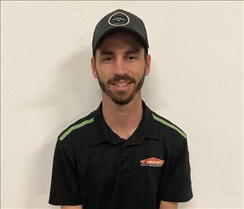 Lance Tomasich, Pictured with SERVPRO polo on white background