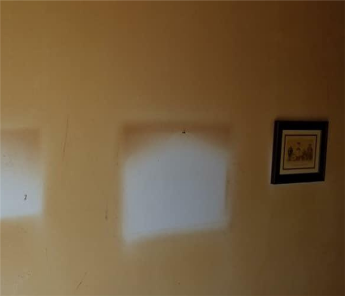 Wall stained with cigarette residue. 